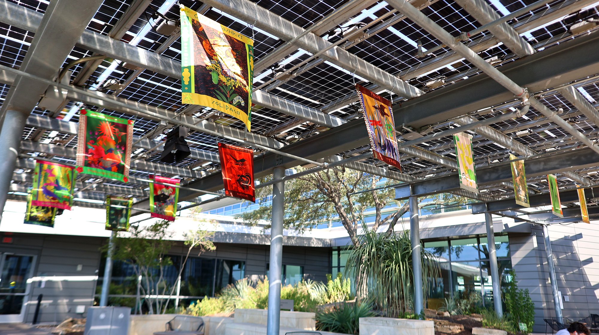 Wide view of complete solar canopy with all tapestries displayed