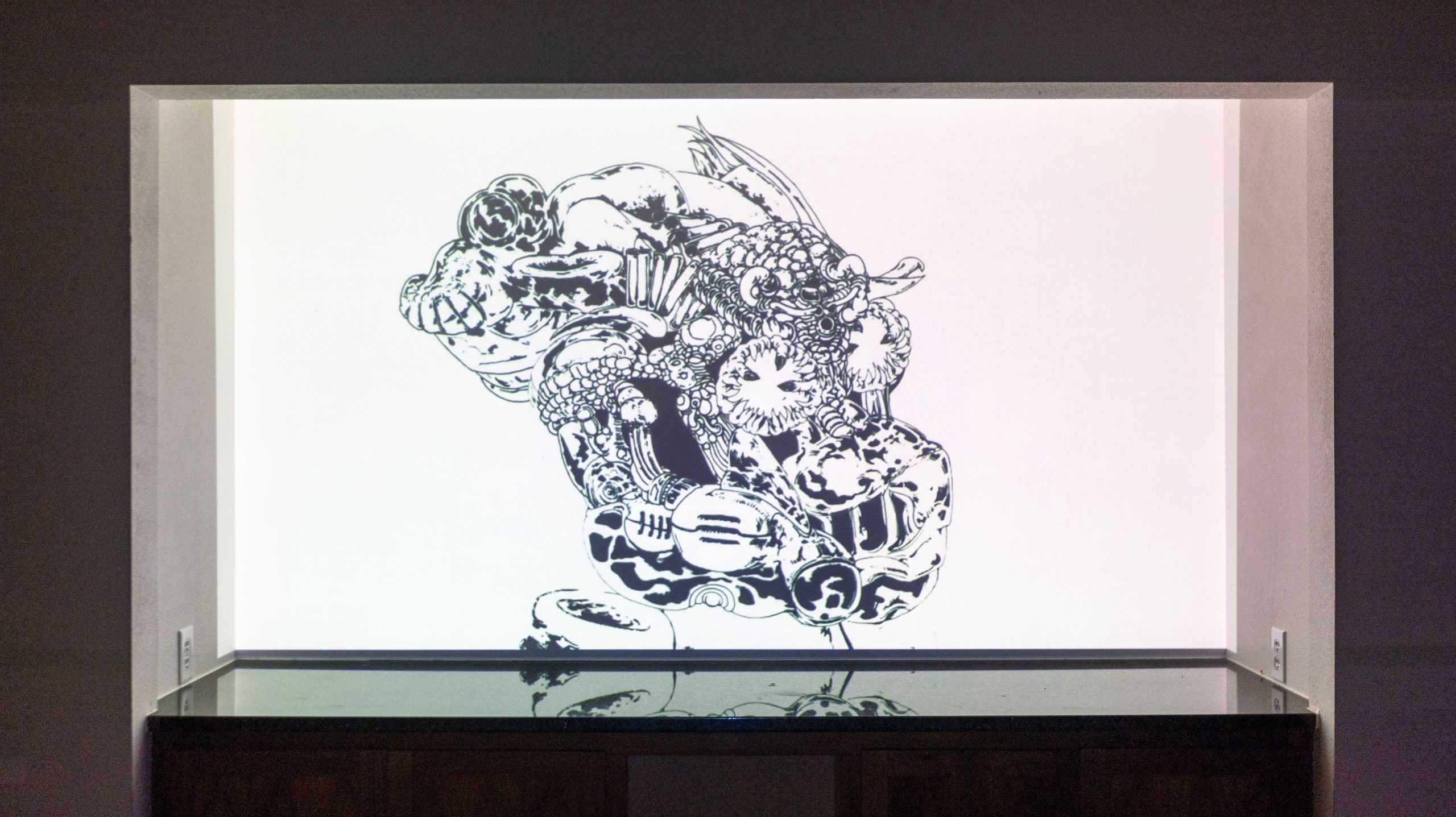 Quiet black-and-white figure projection on a single wall